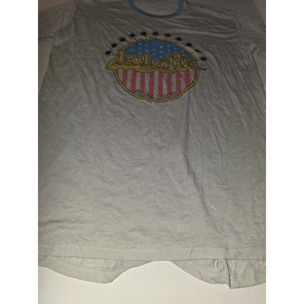 light gray LuLaRoe graphic t-shirt featuring a patriotic "Shine Bright" Sz...